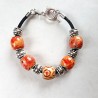 Bracelet style Pandora perles ethniques orangé cordon cuir sur mesure