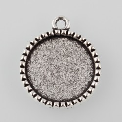 Support de cabochon rond et plat avec tour Eiffel à l'arrière en décor. Couleur argent antique